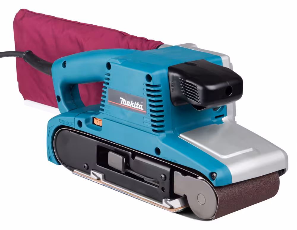 Makita 9404: lijadora de banda 100×610 mm, 1.010 W y 210–440 m/min con conexión a aspiración